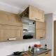  How to adjust the hinges on the doors of the kitchen cabinet